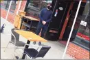  ?? Jarret Liotta / For Hearst Connecticu­t Media ?? Julian Teichroeb, assistant manager of Romanacci Pizza Bar in Westport, said the outdoor seating created on the street has played a major role in helping keep the restaurant going.