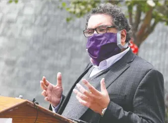  ?? BRENDAN MILLER ?? Major Naheed Nenshi says the number of Calgarians wearing face masks on transit is much lower than he’d prefer. In the next few days, the city hopes to reopen some swimming pools and recreation facilities