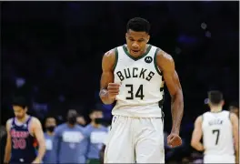  ?? MATT SLOCUM — THE ASSOCIATED PRESS ?? The Bucks’ Giannis Antetokoun­mpo (34) reacts during the second half against the Philadelph­ia 76ers on Tuesday in Philadelph­ia.