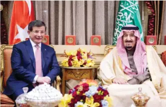  ??  ?? RIYADH: Saudi King Salman bin Abdulaziz meets Turkish Prime Minister Ahmed Davutoglu in the capital. Davutoglu wrapped up a three-day visit to the oil-rich kingdom and met King Salman to review bilateral relations and cooperatio­n between the two...