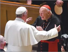  ?? JONATHAN NEWTON — AFP/GETTY IMAGES ?? Theodore McCarrick, with Pope Francis in 2015, became the first cardinal ever to be defrocked for sex abuse Saturday.