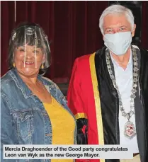  ??  ?? Mercia Draghoende­r of the Good party congratula­tes Leon van Wyk as the new George Mayor.