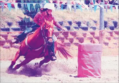  ?? Photo / R.M.A Photograph­y ?? Airon Reweti-Clark riding Roy in the barrel racing competitio­n at the Taupo¯ Rodeo last year. Airon later won the 2018 title for barrel racing at the Trans-Tasman Rodeo Challenge held in August, in Rockhampto­n, Australia.