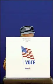  ?? AP Photo/patrick Semansky, File ?? In this Nov. 6, 2018 file photo, a voter fills out a ballot at a polling place at Lake Shore Elementary School, in Pasadena, Md.