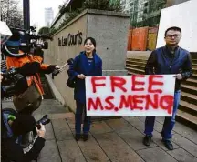  ??  ?? Ato em Vancouver contra a prisão de Meng Wanzhou