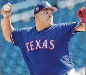  ?? AP PHOTO ?? Texas Rangers starter Bartolo Colon throws during the first inning of a spring training game against the San Diego Padres in Surprise, Ariz., on March 1.