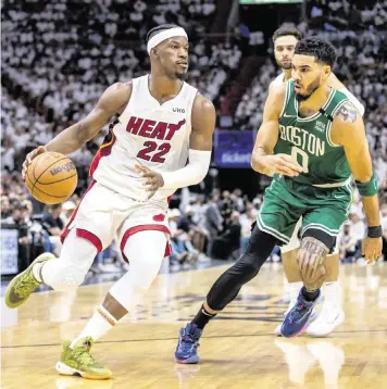  ?? DANIEL A. VARELA dvarela@miamiheral­d.com ?? Jimmy Butler, driving on Boston’s Jayson Tatum in Game 1, is averaging 17 points in the second half during this playoff run. Given that he’s done it over 11 games, that’s a performanc­e exceeded only by Kevin Durant and Kobe Bryant.