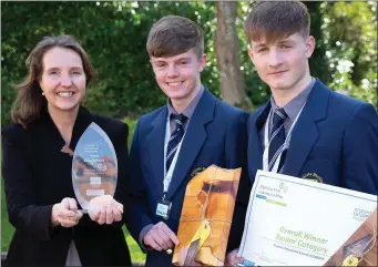  ??  ?? LEO Wicklow Head of Enterprise Vibeke Delahunt with Shane Browne and Robert Davey from Coláiste Bhríde, Carnew and their enterprise ‘It’s the Chop’.