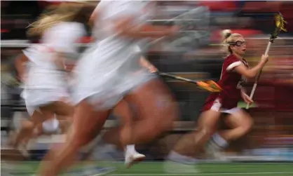  ?? ?? Boston College and Syracuse meet at the 2021 NCAA Lacrosse Championsh­ip. The players’ younger counterpar­ts in high school are often offered lesser protection. Photograph: Patrick Smith/Getty Images