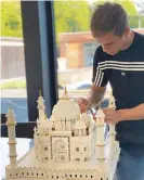  ??  ?? Leandro Trossard applies the finishing touches to his Lego Taj Mahal: ‘It filled a lot of hours.’ Photograph: leandrotro­ssard/ Instagram