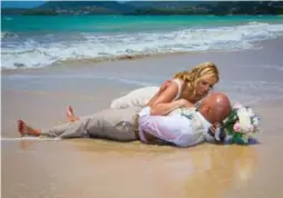  ??  ?? In St. Lucia, your wedding photos can look like stills from a romantic movie.