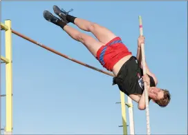  ?? Photo by Becky Polaski ?? SMA’s Jason McAnany won pole vault in Tuesday’s meet, clearing 11’.