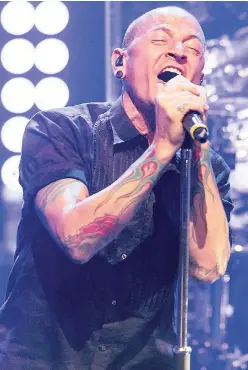  ??  ?? In this June 18, 2014 file photo, Chester Bennington of Linkin Park performs during the iHeartRadi­o Live Series in Burbank, California. Bennington committed suicide on July 20.