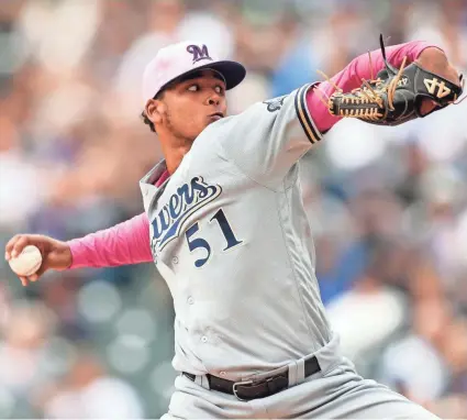  ?? ISAIAH J. DOWNING / USA TODAY SPORTS ?? Freddy Peralta had an impressive first start for the Brewers on Mother's Day. The rookie pitcher struck out 13 batters and allowed just one hit and two walks in 52⁄3 innings.