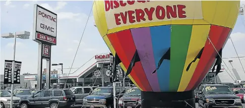  ?? Picture: Getty Images ?? Balloon payments can put an unaffordab­le vehicle within your reach but the cost is high. Car dealership­s like this one in the US town of LaGrange, Illinois, often fail to point out the pitfalls.