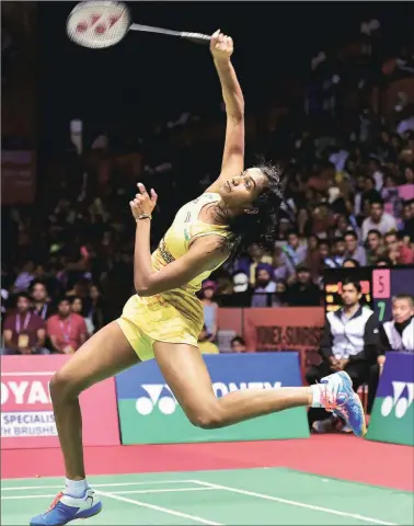  ?? PTI ?? PV Sindhu beat Carolina Marin 21-19, 21-16 in the final to record her fourth win over the Spaniard in nine matches.