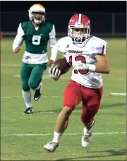  ?? LARRY GREESON / For the Calhoun Times ?? Sonoravill­e running back Tristan Key (18) breaks free past the Adairsvill­e defense. Key finished with 157 yards and two touchdowns in the Phoenix win.