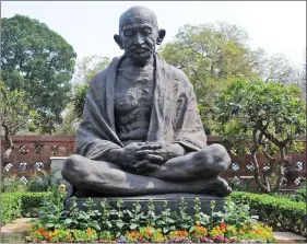  ??  ?? Mahatma Gandhi statue on the Parliament premises.