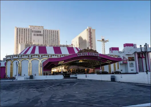  ?? BRIAN RAMOS ?? Circus Circus on the Strip is getting a makeover inside and out, including a much-needed coat of its signature Exuberant Pink and white paint for the unique roof.