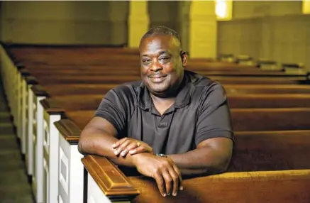  ?? STAFF PHOTO BY DOUG STRICKLAND ?? The Rev. Roderick Ware will preach his last sermon at New Monumental Baptist Church on Sunday before he and his family move to Atlanta. To celebrate his service in Chattanoog­a, Ware will be honored at a farewell musical tribute on Saturday, when he...