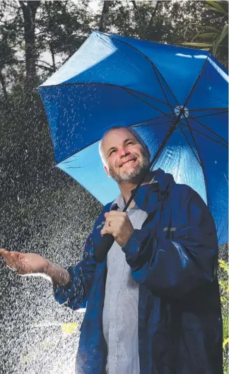  ?? Picture: GLENN HAMPSON ?? Wayne Randall from The Mouses House at Springbroo­k is hoping the mountain won’t break any more rainfall records in 2018 after copping a soaking in 2017.