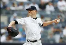  ?? NOAH K. MURRAY — THE ASSOCIATED PRESS ?? New York Yankees starting pitcher J.A. Happ pitches in the first inning of a baseball game against Toronto Blue Jays, Sunday in New York.