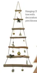  ??  ?? Hanging Christmas tree with decoration­s , $50. perchhomew­ares.co.nz