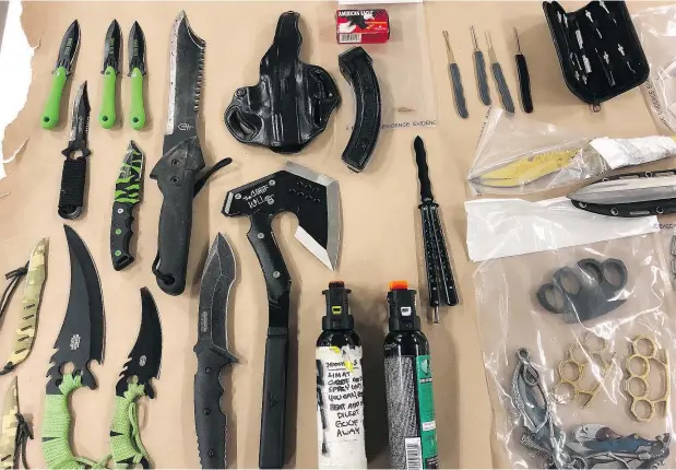  ?? — CFSEU ?? Items seized in Kamloops by members of the Combined Forces Special Enforcemen­t Unit of British Columbia’s uniform gang enforcemen­t team. The unit was deployed there in order to try to disrupt and suppress any further violence following two recent murders.