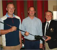  ??  ?? Laytown & Bettystown GC Profession­al Scott Kirkpatric­k and Captain Bryan Collins present Anthony Gallagher with the Profession­al’s Prize.