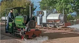  ?? ?? Steaming side by side but a century apart are1922-built Peter Pan and the new Corris No. 10.