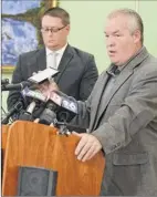  ?? Lori Van Buren / times union ?? Cohoes mayor Shawn morse plays a recording of his wife on his cellphone at a news conference on monday.