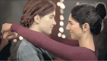 ?? Naughty Dog ?? A KISS in “The Last of Us Part 2” is a highlight made possible by the narrative style of single-player gaming.