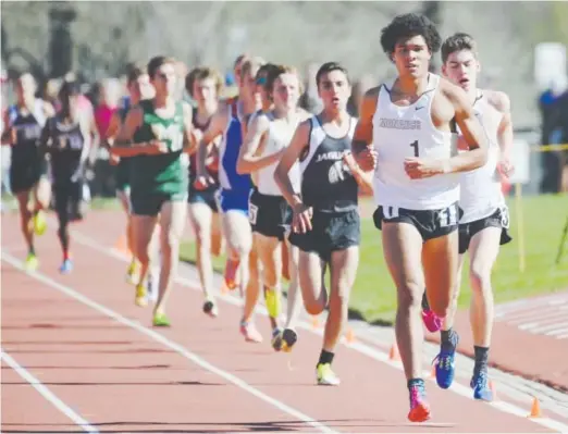  ?? Kathryn Scott, The Denver Post ?? Monarch’s Isaac Green leads the pack in the Class 5A boys 3,200-meter event at Jeffco Stadium in Lakewood on Saturday.