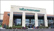  ?? LISA POWELL / STAFF ?? The Whole Foods Market at 1050 Miamisburg Centervill­e Road opened in 2015. Amazon is buying Whole Foods in a deal valued at about $13.7 billion.