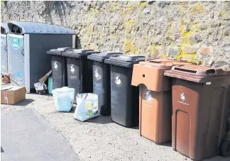  ??  ?? Bins The council is gradually replacing outdated bins but one reader is confused over the timetable