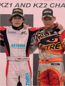  ??  ?? Charles Leclerc e Max Verstappen, entrambi 14enni, sul podio di gara1 dell’Europeo di kart 2012 a Wackersdor­f, in Germania CIK-FIA