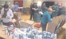  ??  ?? Hard at work Volunteers at the Rutherglen and Cambuslang Foodbank