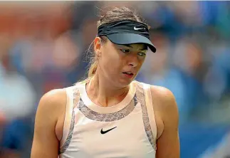  ?? RICHARD HEATHCOTE/GETTY IMAGES ?? Maria Sharapova’s run at the US Open came to an end in the fourth round, beaten by Anastasija Sevastova of Latvia.