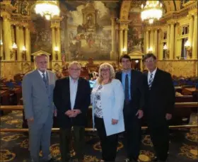  ?? PHOTO COURTESY OF NORTH WALES 150COMMITT­EE ?? North Wales Borough officials pose at the Pennsylvan­ia Capitol building in Harrisburg on June 4 after hearing a resolution from State Rep. Liz Hanbidge commemorat­ing the borough’s 150th anniversar­y. From left to right are Mayor Greg D’Angelo, council President Jim Sando, Borough Manager Christine Hart, Assistant Manager Alan Guzzardo and 150th anniversar­y committee Co-Chair James Schiele.