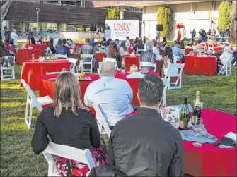  ?? Bizuayehu Tesfaye Las Vegas Review-journal @bizutesfay­e ?? LEFT: UNLV School of Medicine graduates attend Match Day on Friday. Of 50 graduating students, 18 will stay in Nevada for their residency.