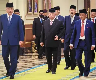  ?? ?? Holding court: sultan Ibrahim (centre) flanked by sultan nazrin (left) and sultan sallehuddi­n (right) and other dignitarie­s during the Conference of rulers held in Istana negara. also among them are Tun Juhar mahiruddin, Tengku Hassanal Ibrahim and Tun mohd ali rustam. — bernama
