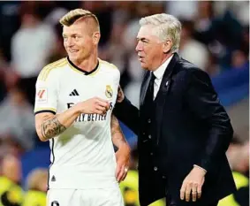  ?? LAPRESSE ?? Toni Kroos, junto a Carlo Ancelotti.