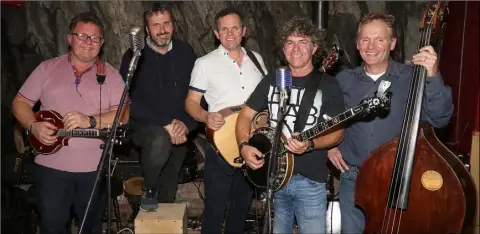  ??  ?? The Kiss My Grass band performing in Holohan’s Bar at the Slaney Valley Bluegrass Festival.