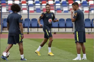  ?? EKATERINA LYZLOVA — THE ASSOCIATED PRESS ?? Brazil’s Neymar works out during a training session July 4 in Sochi, Russia.