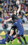  ?? Picture: AFP ?? New Zealand’s Jordie Barrett is tackled without the ball by France’s Dany Priso, right, and Anthony Belleau.