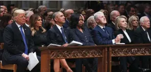  ?? The New York Times/TOM BRENNER ?? President Donald Trump (from left), his wife, Melania; former President Barack Obama and his wife, Michelle; former President Bill Clinton and Hillary Clinton; and former President Jimmy Carter and his wife, Rosalyn (not pictured) share the front pew Wednesday at the National Cathedral for the funeral of former President George H.W. Bush.