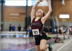  ?? Photo by Jerry Silberman / risportsph­oto.com ?? It was a bitterswee­t state indoor meet for Woonsocket senior Alissiana Folco, who nearly won two state titles, but settled for second-place finishes in the long jump and the 55-meter hurdles.