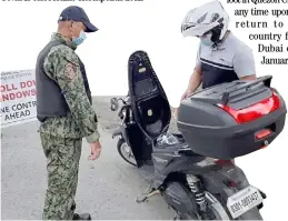  ?? PHOTOGRAPH COURTESY OF ARAYAT MPS PAMPANGA ?? ARAYAT border officers strictly monitor motorcycle riders.