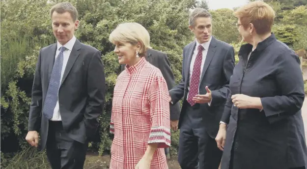  ??  ?? Foreign Secretary Jeremy Hunt and Defence Secretary Gavin Williamson meet with Australian counterpar­ts, Julie Bishop and Marise Payne at Edinburgh’s Botanic Garden
