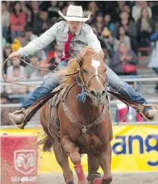  ?? FILES ?? Katie Garthwaite races home to victory at last year’s Cloverdale Rodeo. Garthwaite says there is a unique bond between horse and rider.